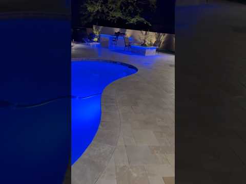Thumbnail from the published Glowing Pool! project Short, showing a blue-lit pool edge and paver surface.